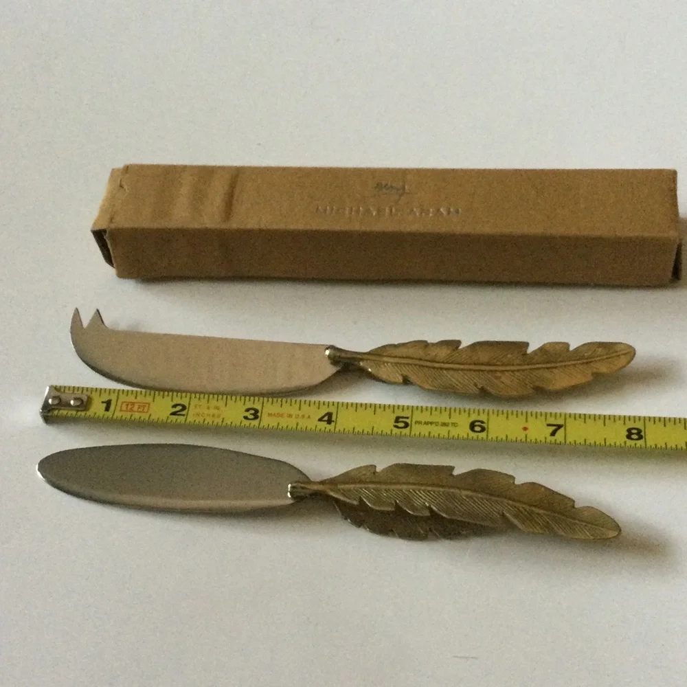 MICHAEL ARAM SET OF 2 FEATHER HANDLED CHEESE KNIVES NWT